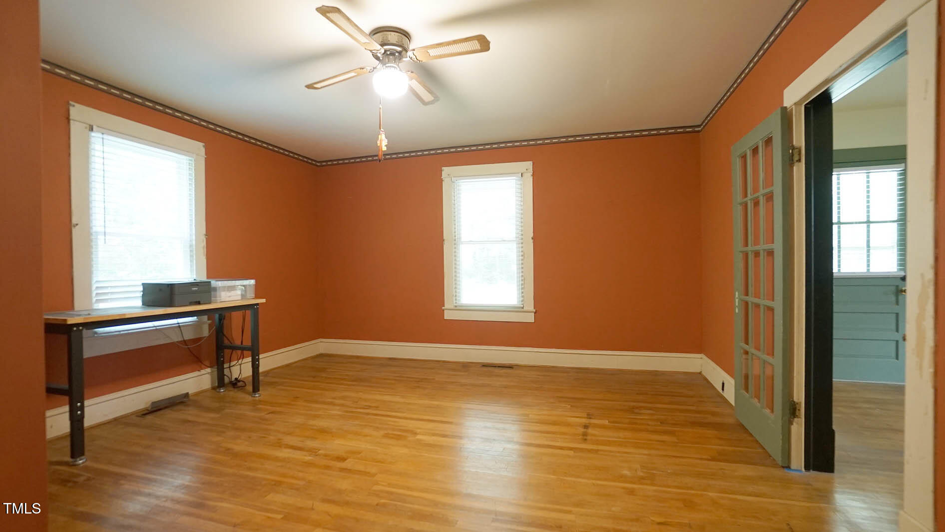 131 King Road Warrenton, NC 27589 - Photo 48 of 67 a view of an empty room with window and wooden floor
