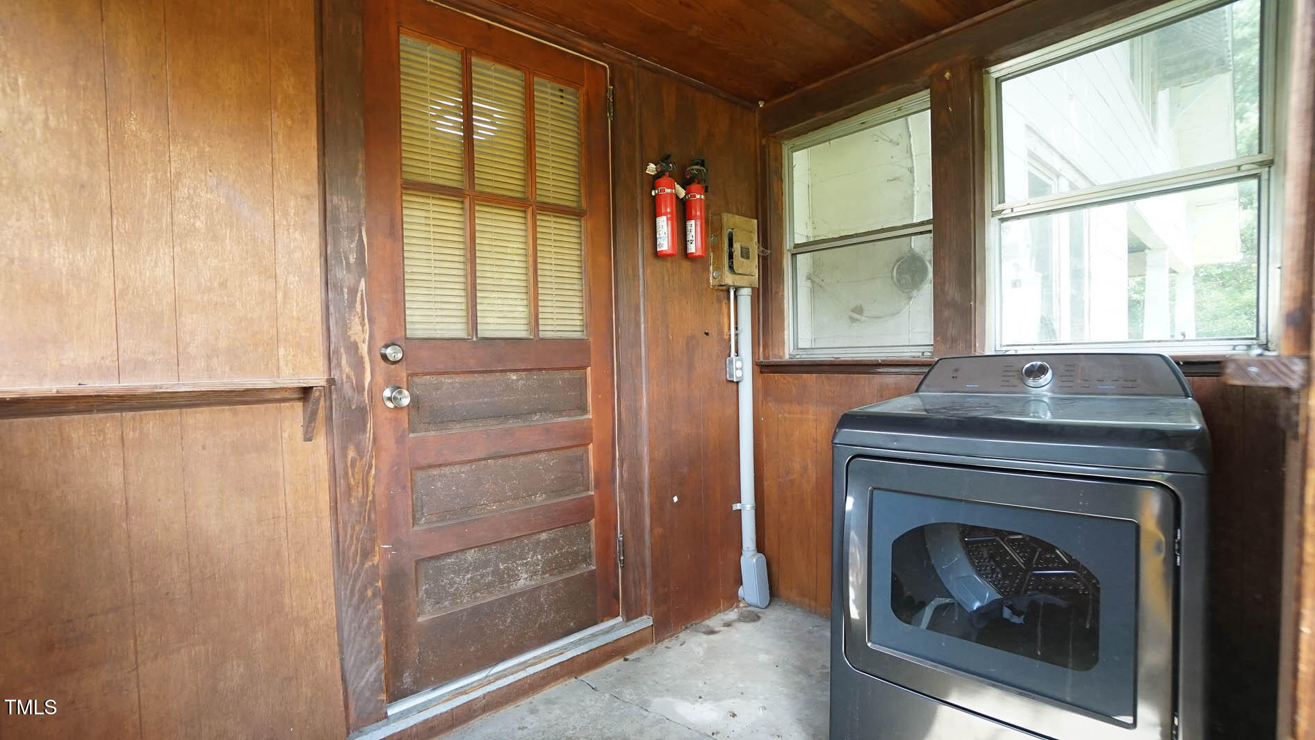131 King Road Warrenton, NC 27589 - Photo 57 of 67 a living room with a fireplace and a walk in closet