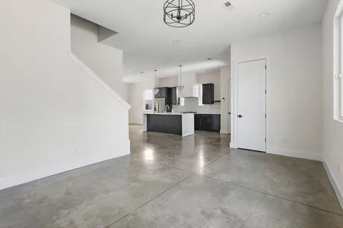 a view of a kitchen with a sink