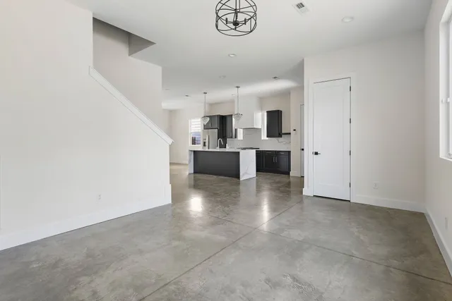 a view of a kitchen with a sink