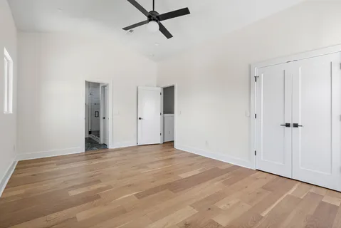 a bathroom with double sink and a mirror