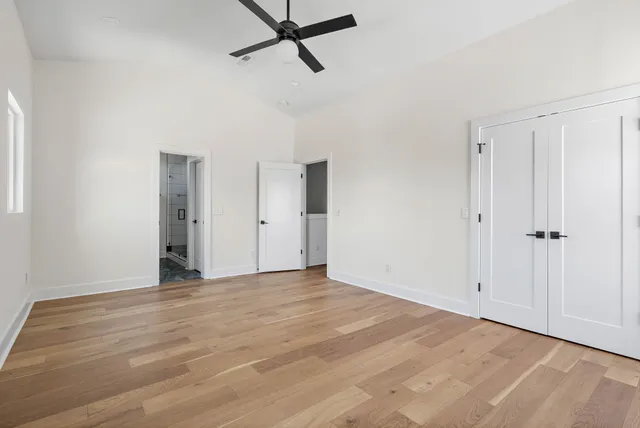a bathroom with double sink and a mirror