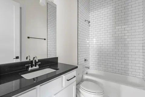 a view of backyard with green space