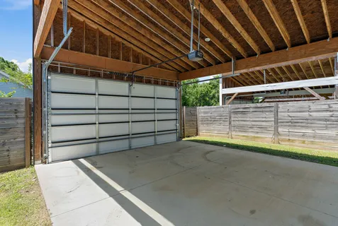 a view of a backyard with a garden