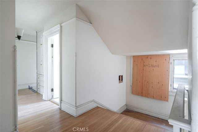 a view of entryway with wooden floor