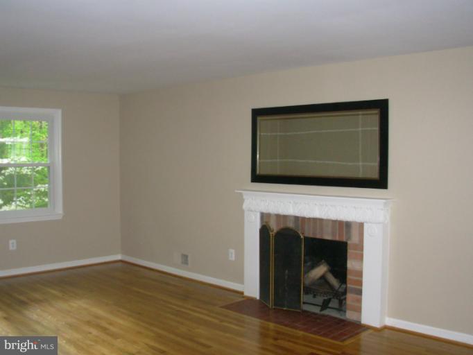 6700 Red Jacket Road Springfield, VA 22152 - Photo 2 of 9 Living Room with Fireplace