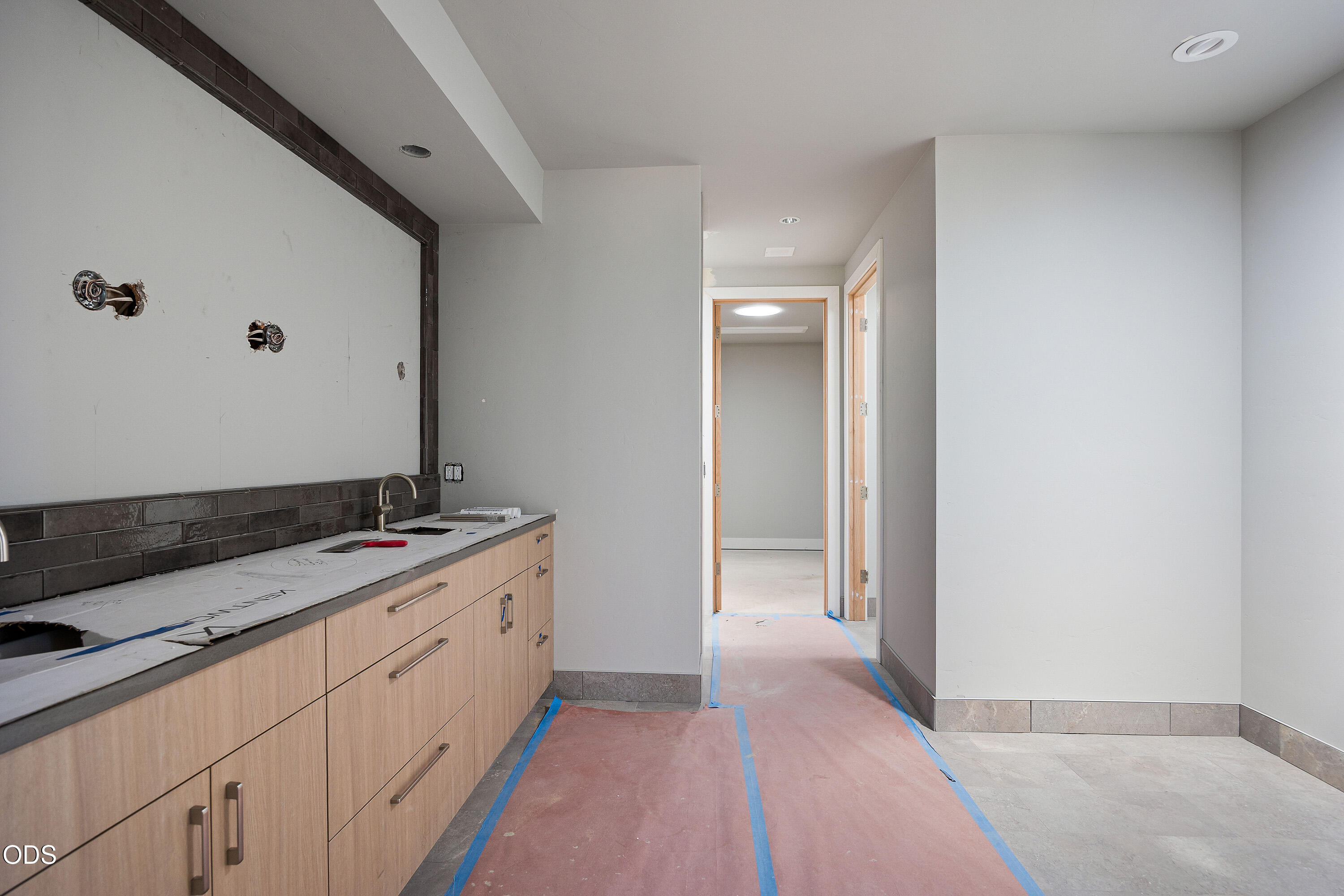 22936 Ghost Tree Lane Bend, OR 97701 - Photo 16 of 45 a spacious bathroom with a granite countertop sink and a mirror