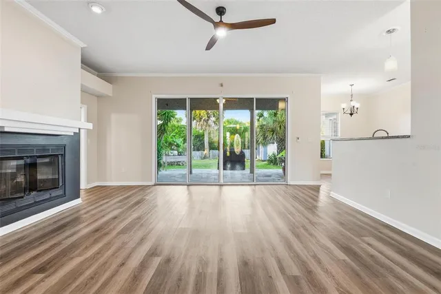 a kitchen with a sink stove and microwave