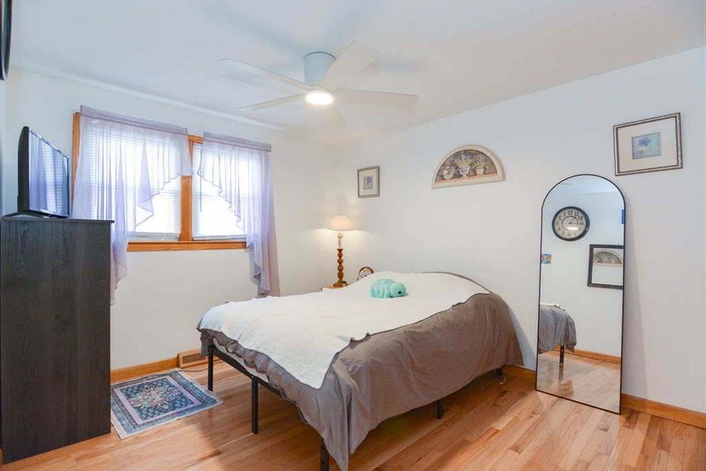 51 Heritage Road Billerica, MA 01821 - Photo 13 of 32 a bedroom with a bed and a closet