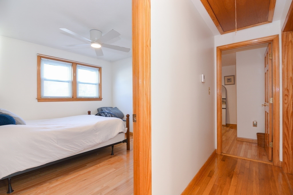 51 Heritage Road Billerica, MA 01821 - Photo 15 of 32 a bedroom with a bed and a window