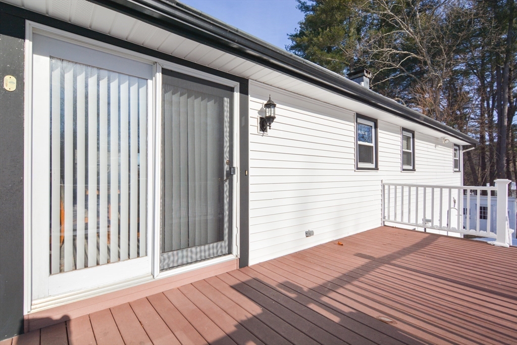 51 Heritage Road Billerica, MA 01821 - Photo 23 of 32 a view of a wooden deck