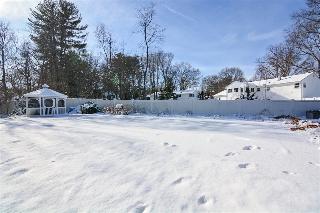 51 Heritage Road Billerica, MA 01821 - Photo 26 of 32 a house with a outdoor space