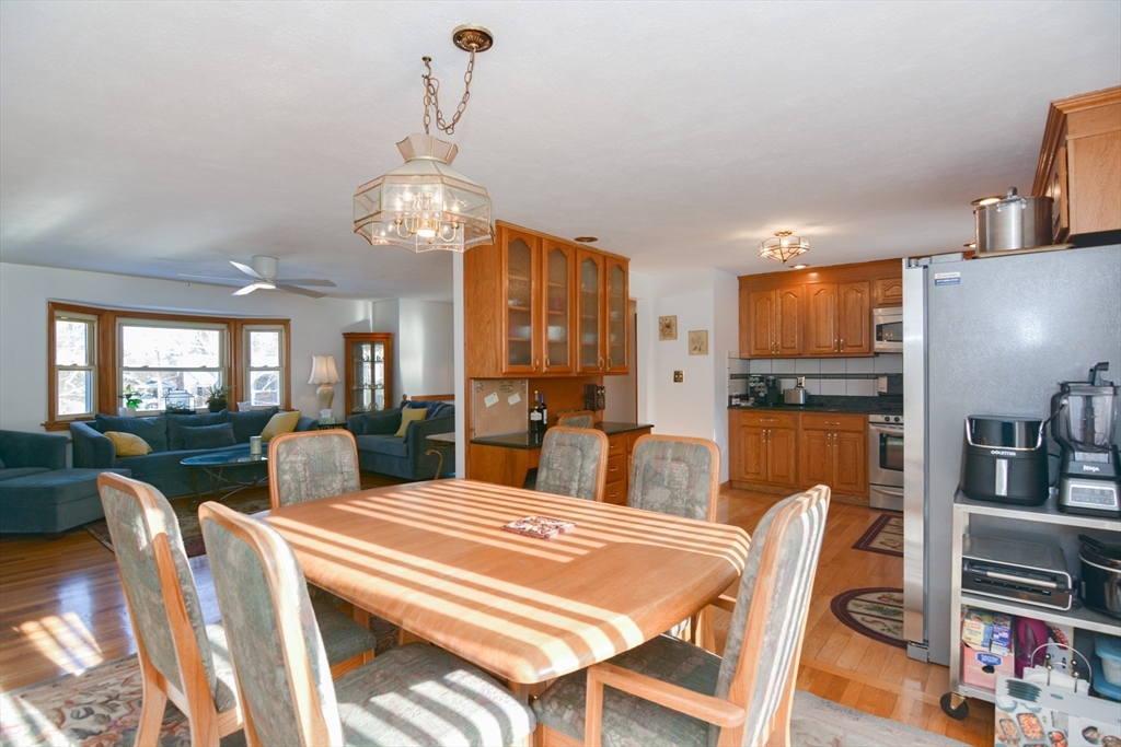 51 Heritage Road Billerica, MA 01821 - Photo 9 of 32 a view of a dining room with furniture window and outside view