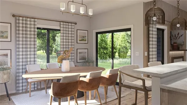 a view of a dining room with furniture window and outside view
