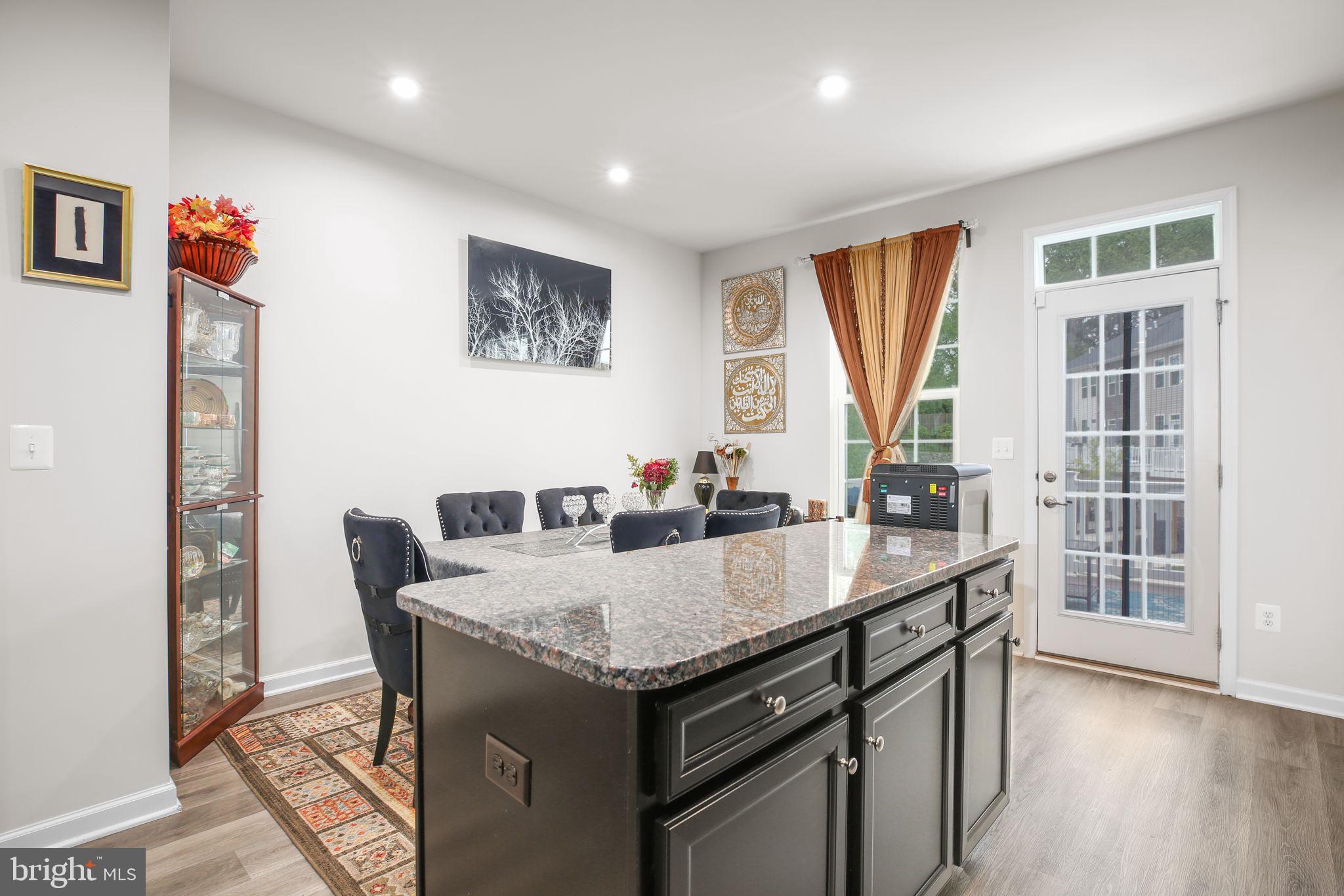 18353 Reaper Hl Court Triangle, VA 22172 - Photo 8 of 29 Kitchen island offers space for prep and storage
