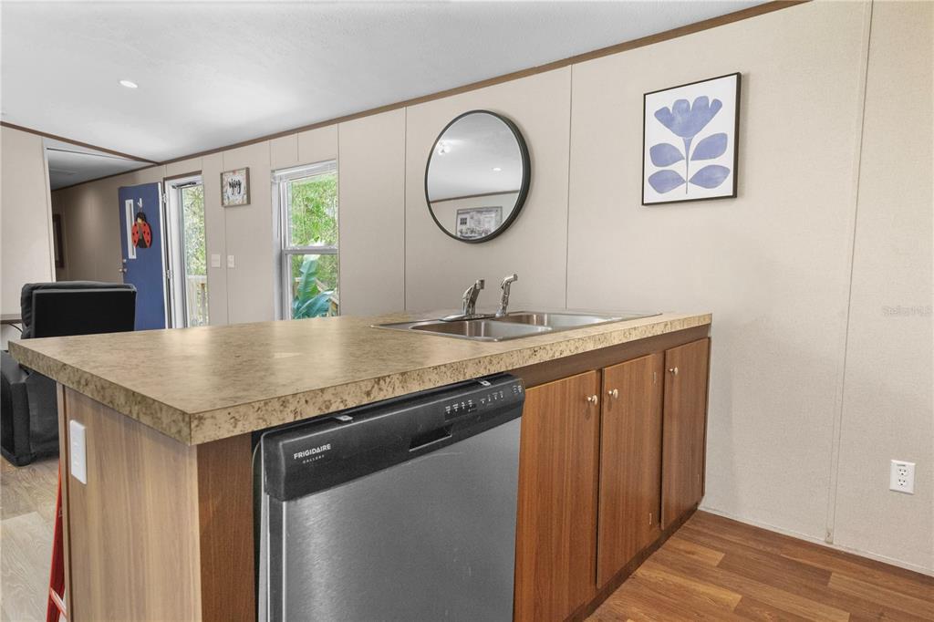 16770 Southwest 60th Place Ocala, FL 34481 - Photo 14 of 26 a bathroom with a granite countertop sink and a mirror