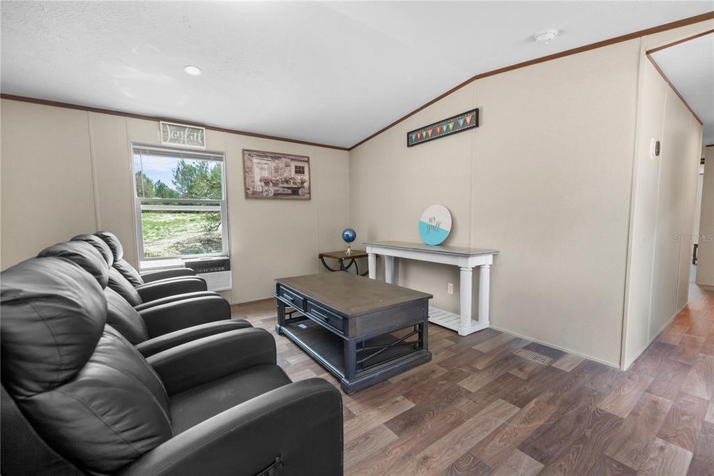 16770 Southwest 60th Place Ocala, FL 34481 - Photo 8 of 26 a living room with furniture