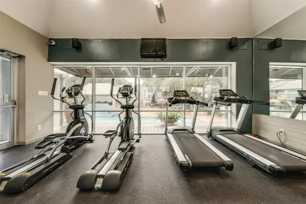 a view of a room with gym equipment