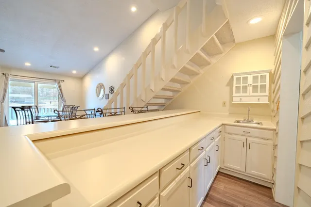 a kitchen that has a stove and a refrigerator
