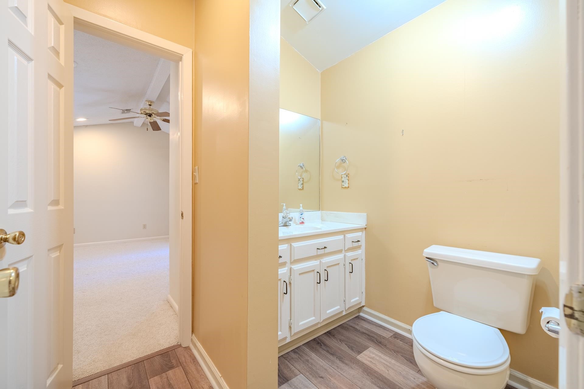 116 Driftwood Road Counce, TN 38326 - Photo 23 of 31 a bathroom with a toilet a sink and a mirror