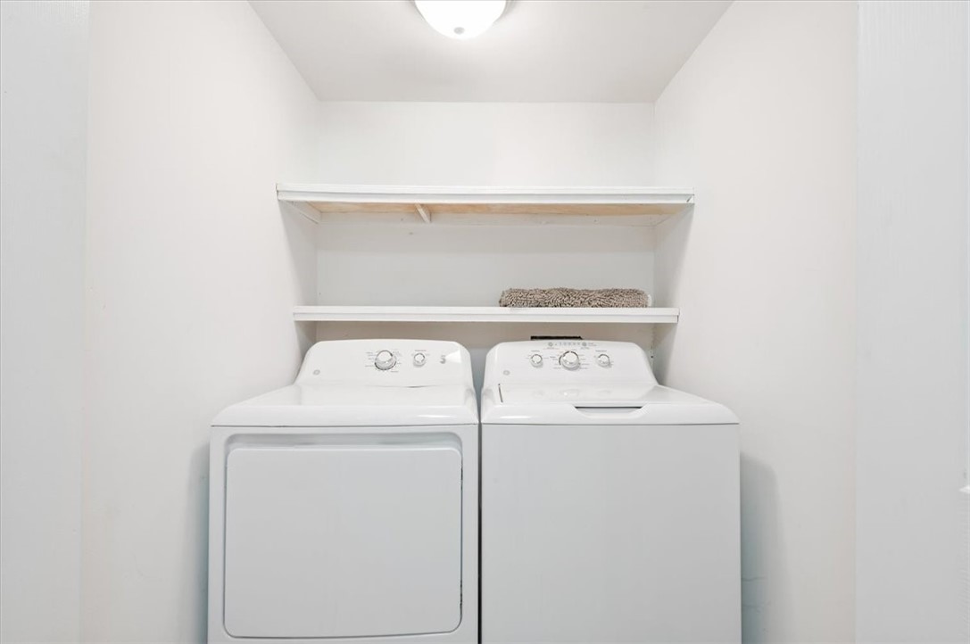 238 Broadway Street St. Simons Island, GA 31522 - Photo 31 of 56 The laundry room is very conveniently located close to the primary suite.