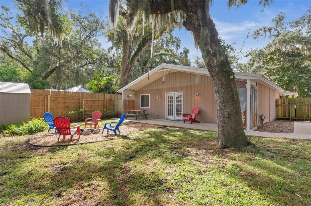 238 Broadway Street St. Simons Island, GA 31522 - Photo 33 of 56 Enjoy an evening around the fire pit after dinner on the patio!