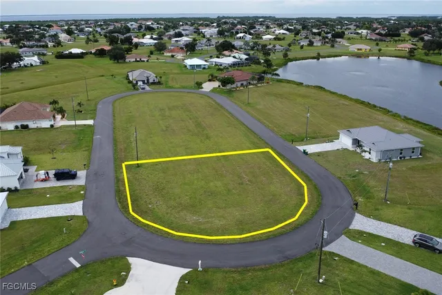 an aerial view of a house with outdoor space