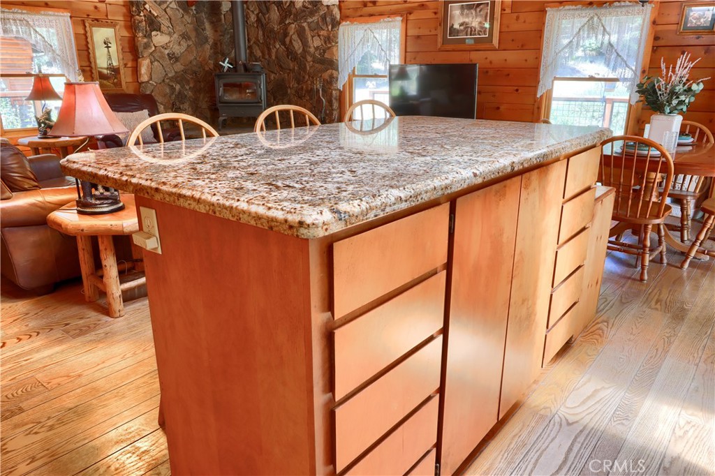 7190 Hites Cove Road Mariposa, CA 95338 - Photo 15 of 61 a backyard of a house with barbeque oven table and chairs