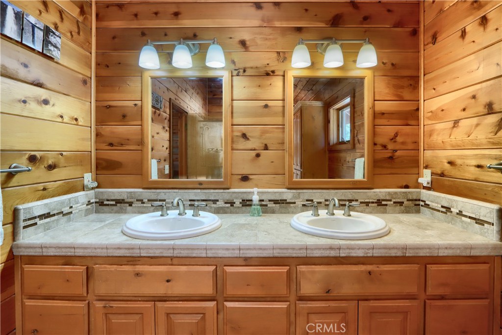 7190 Hites Cove Road Mariposa, CA 95338 - Photo 27 of 61 a bathroom with a sink and a mirror