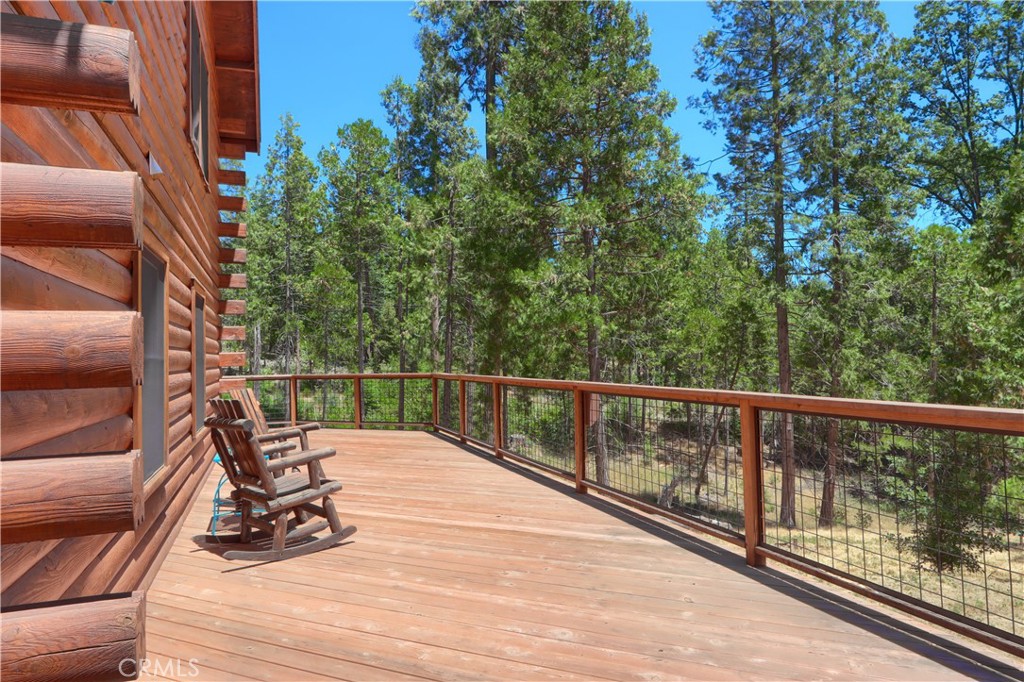 7190 Hites Cove Road Mariposa, CA 95338 - Photo 33 of 61 a view of balcony with wooden floor and fence