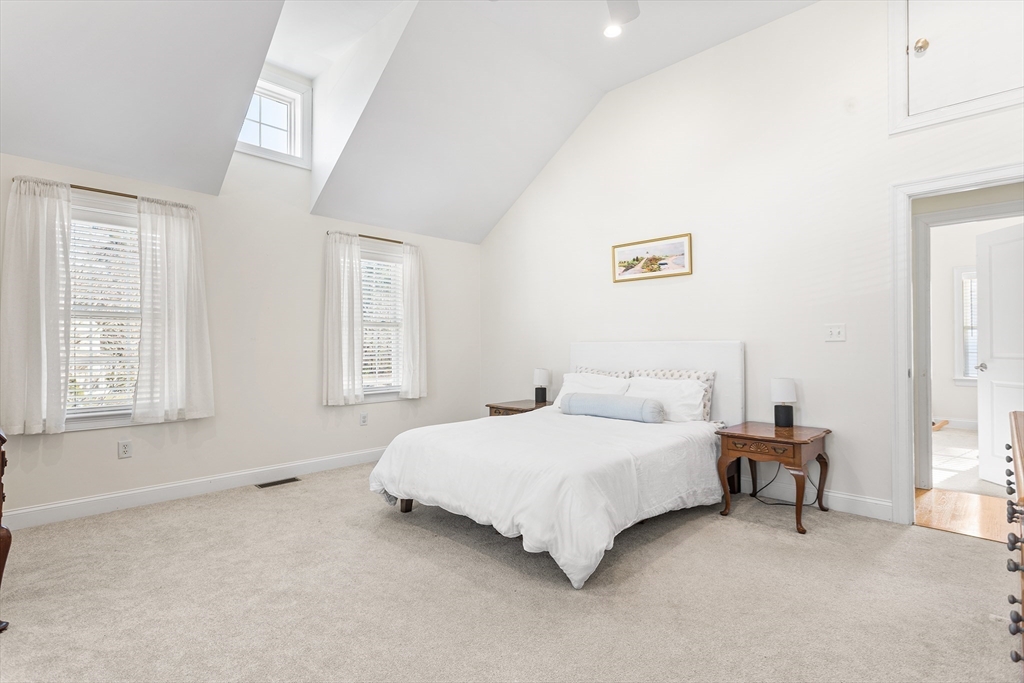 3 Fieldstone Circle, Unit 3 Wareham, MA 02576 - Photo 15 of 25 a bedroom with a bed and a window