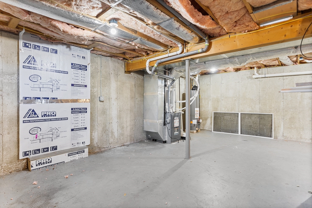 3 Fieldstone Circle, Unit 3 Wareham, MA 02576 - Photo 24 of 25 a view of walk in closet with empty racks