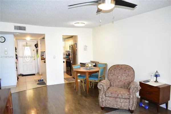 a workspace with furniture and wooden floor