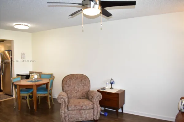a workspace with furniture and wooden floor