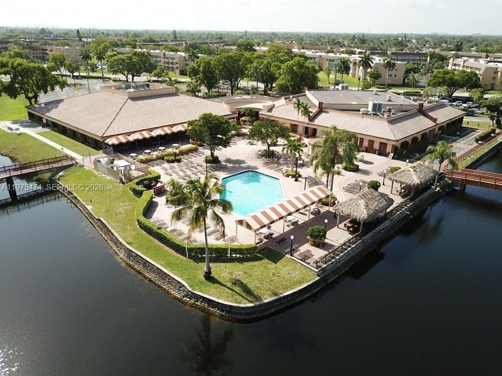 2801 North Pine Island Road, Unit 112 Sunrise, FL 33322 - Photo 46 of 49 a view of a lake with a mountain