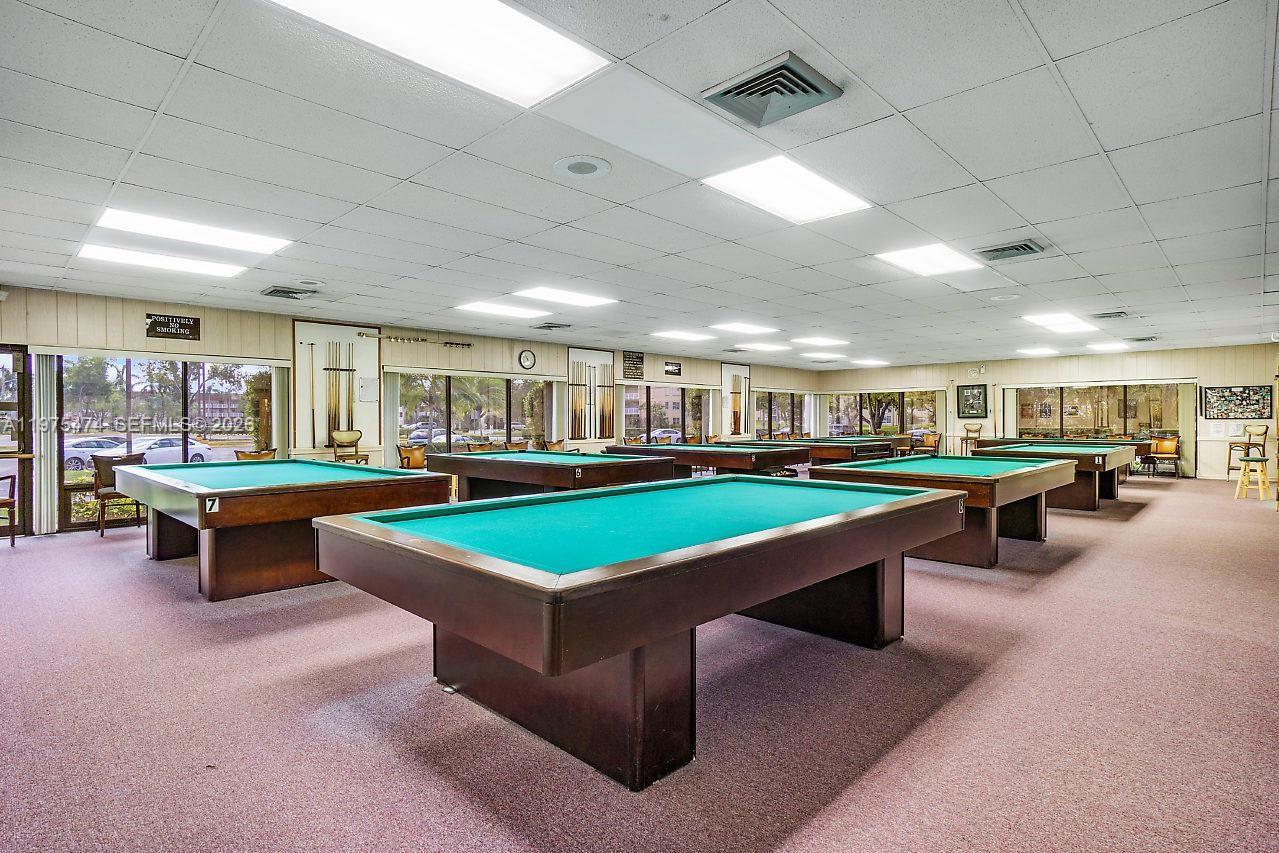 2801 North Pine Island Road, Unit 112 Sunrise, FL 33322 - Photo 47 of 49 a room with pool table table tennis chairs