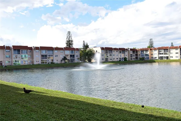 a view of a lake with buildings