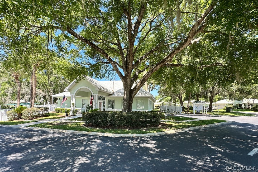 800 Balmoral Court Inverness, FL 34453 - Photo 47 of 72 a front view of a house with a yard