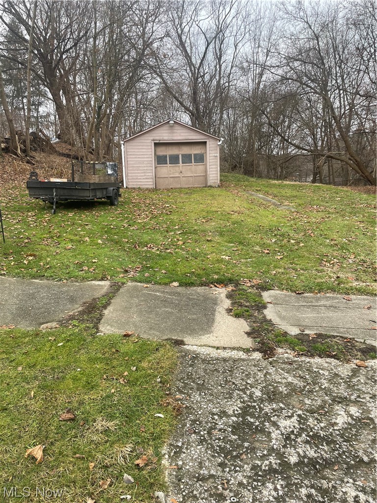 790 Springdale Street Akron, OH 44310 - Photo 1 of 2 View of yard featuring a garage