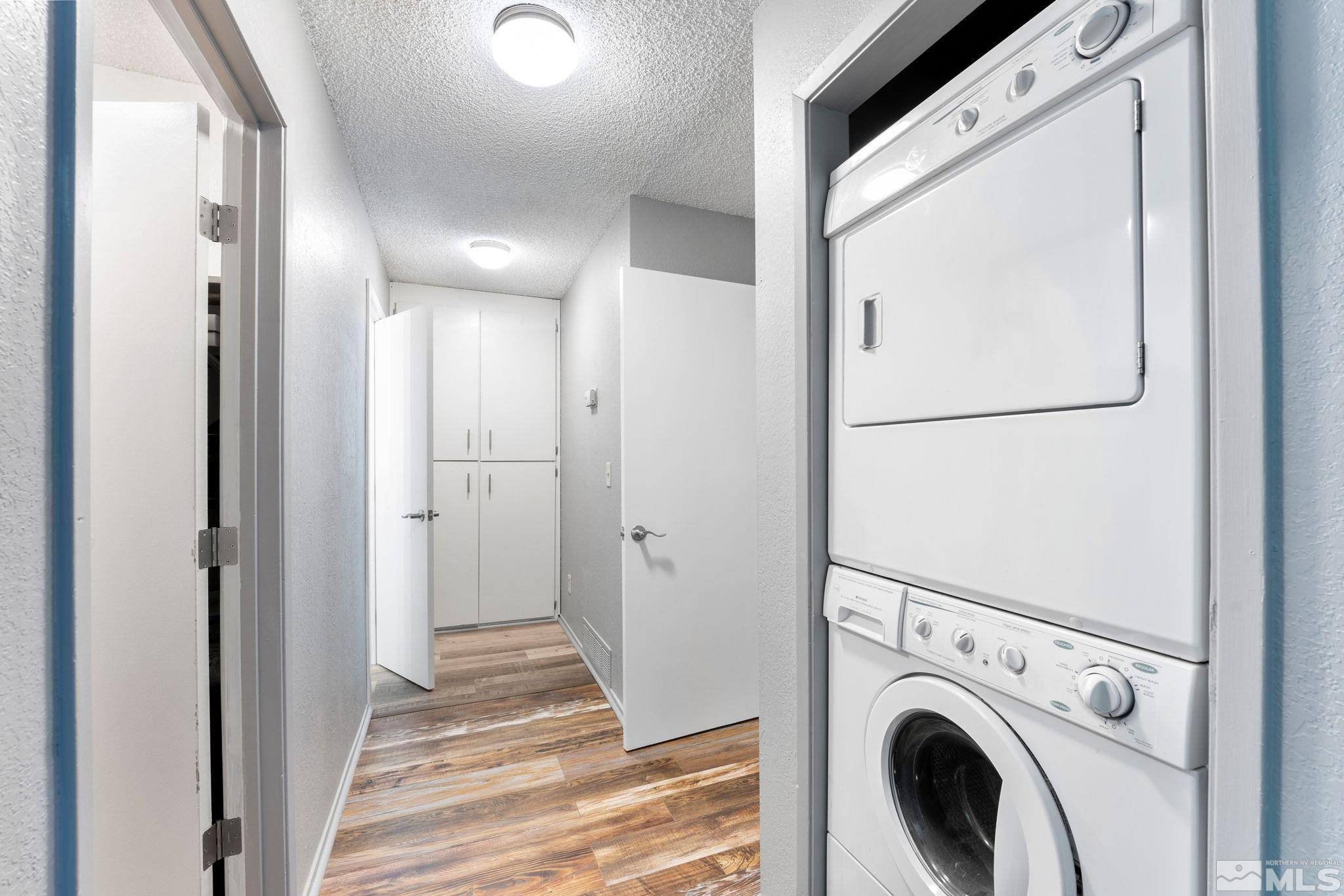 2300 Dickerson Road, Unit 64 Reno, NV 89503 - Photo 10 of 29 a view of a hallway with washer and dryer
