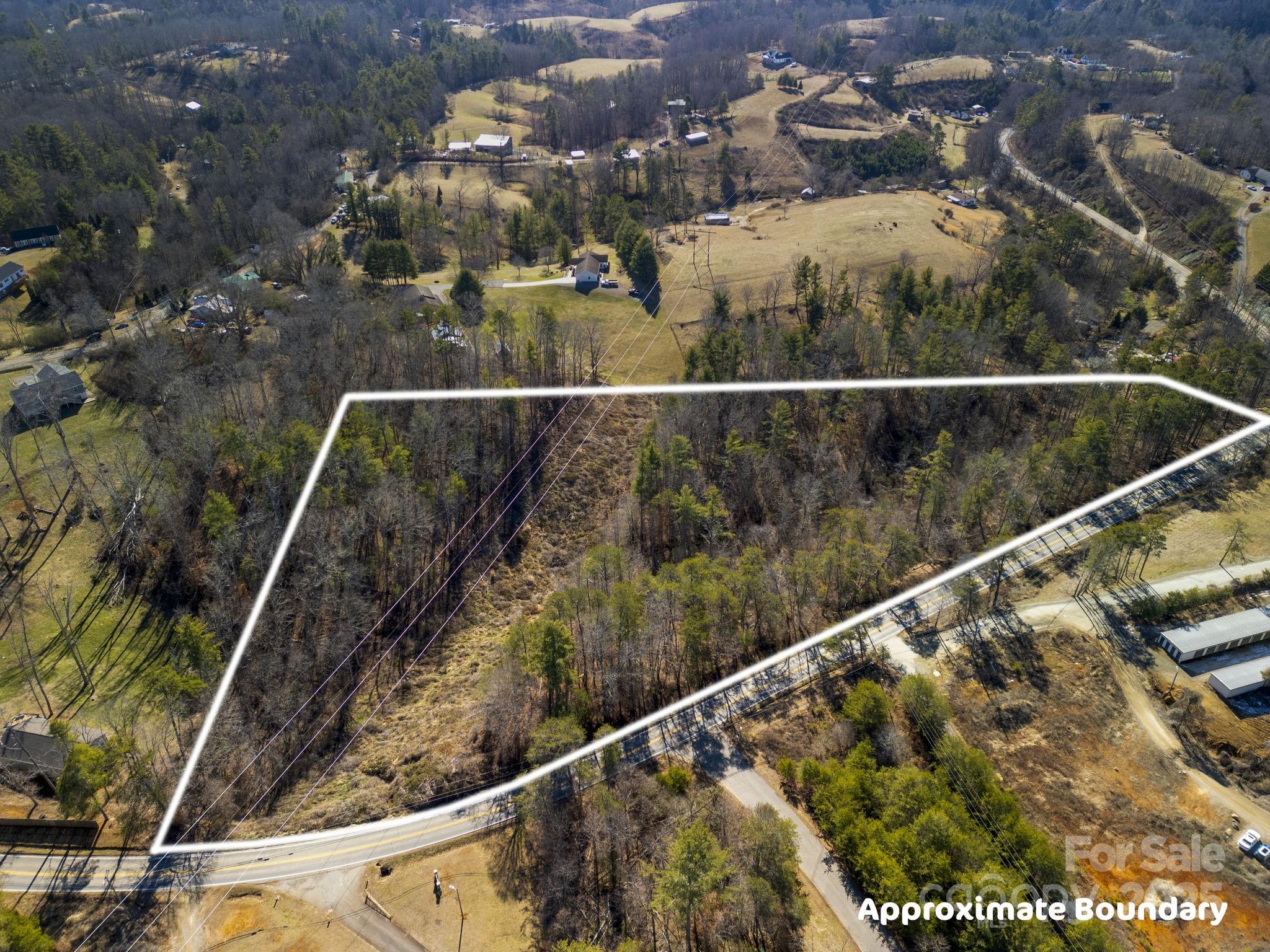99999 Monticello Road Weaverville, NC 28787 - Photo 13 of 25 a view of a lake from a balcony