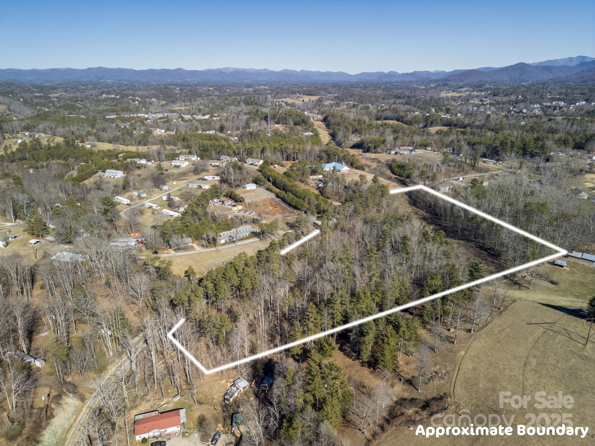 99999 Monticello Road Weaverville, NC 28787 - Photo 22 of 25 a view of city and mountain