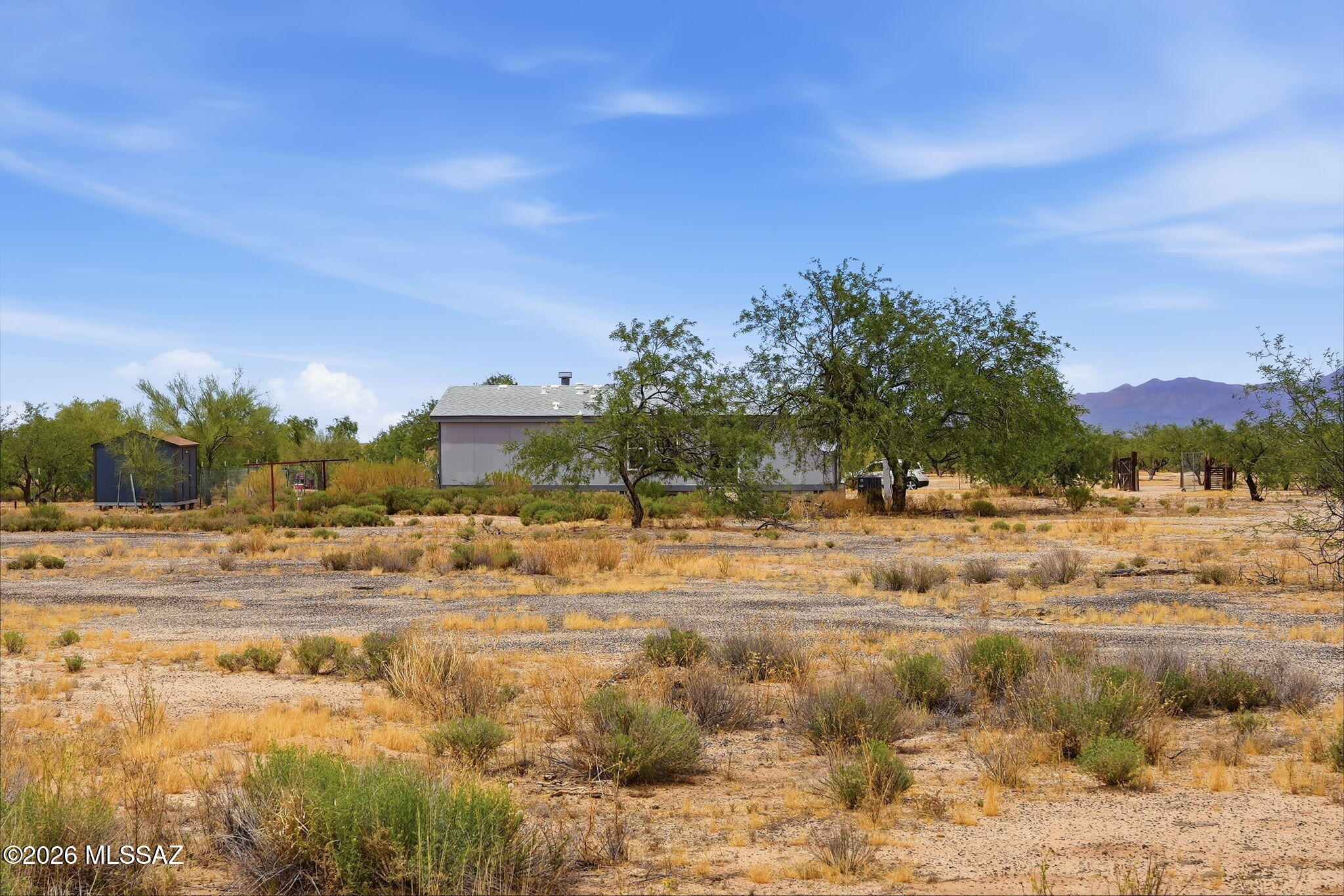 8690 South Marstellar Road Tucson, AZ 85736 - Photo 11 of 51 So much space with beautiful desert surroundings and mountain views galore!