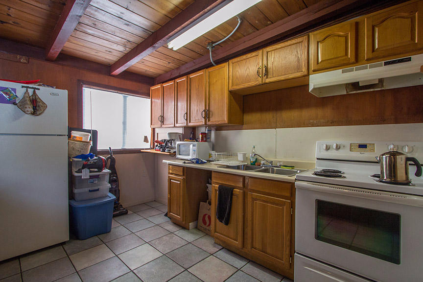 1732 Ash Street Fortuna, CA 95540 - Photo 30 of 37 a kitchen with a stove top oven a sink and dishwasher