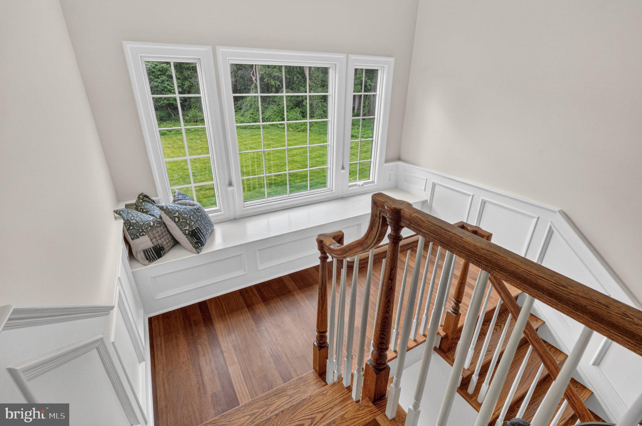 342 Ring Road Chadds Ford, PA 19317 - Photo 35 of 95 Sunlit staircase with scenic views.