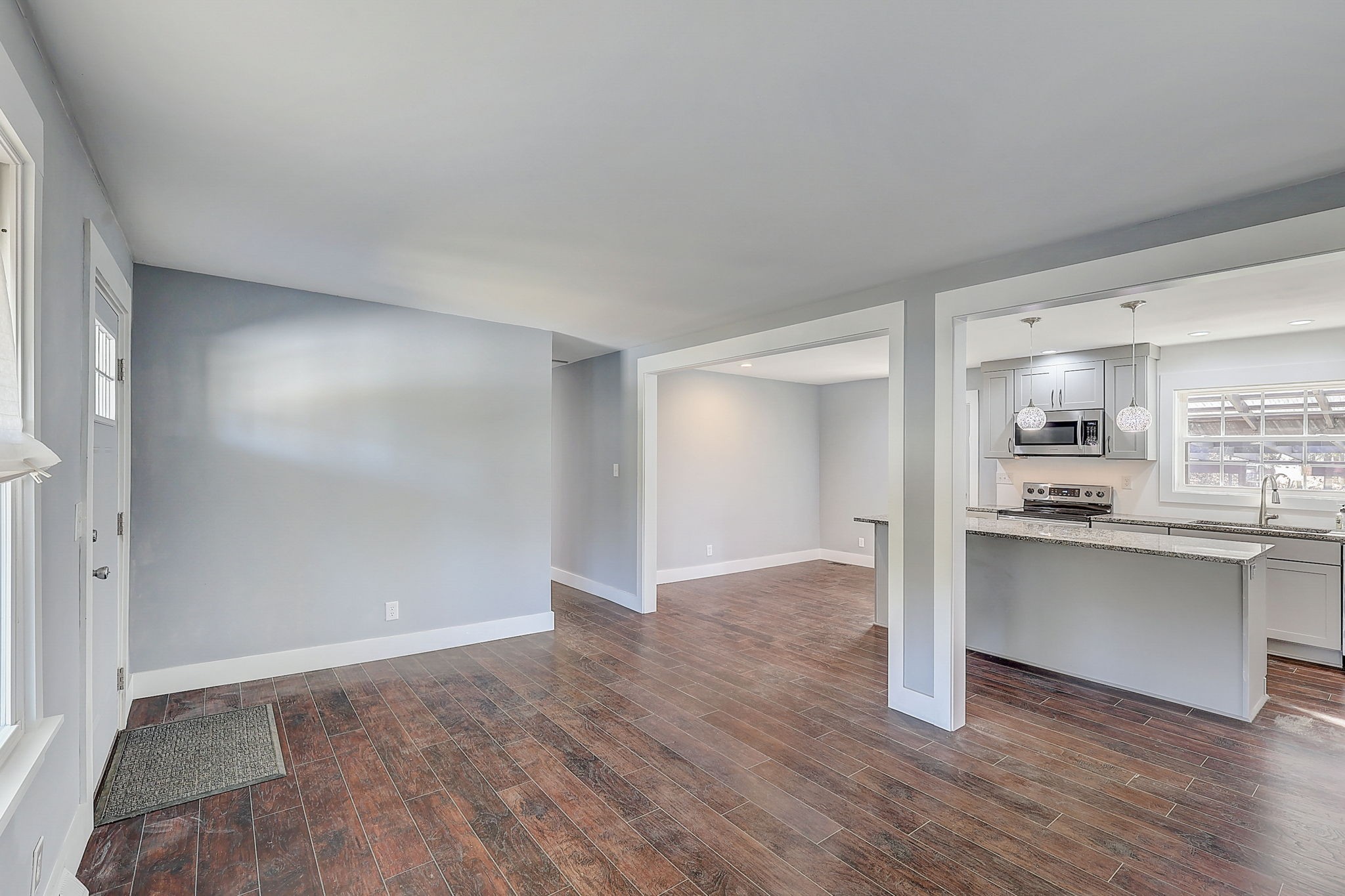 280 Dean Road Clarksville, TN 37040 - Photo 8 of 33 a view of a kitchen with wooden floor and a sink
