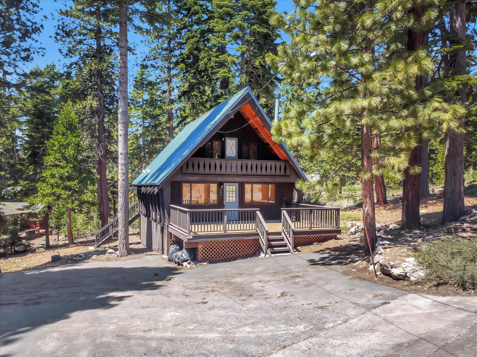 505 Granite Road Carnelian Bay, CA 96140 - Photo 1 of 20 a front view of a house with a yard