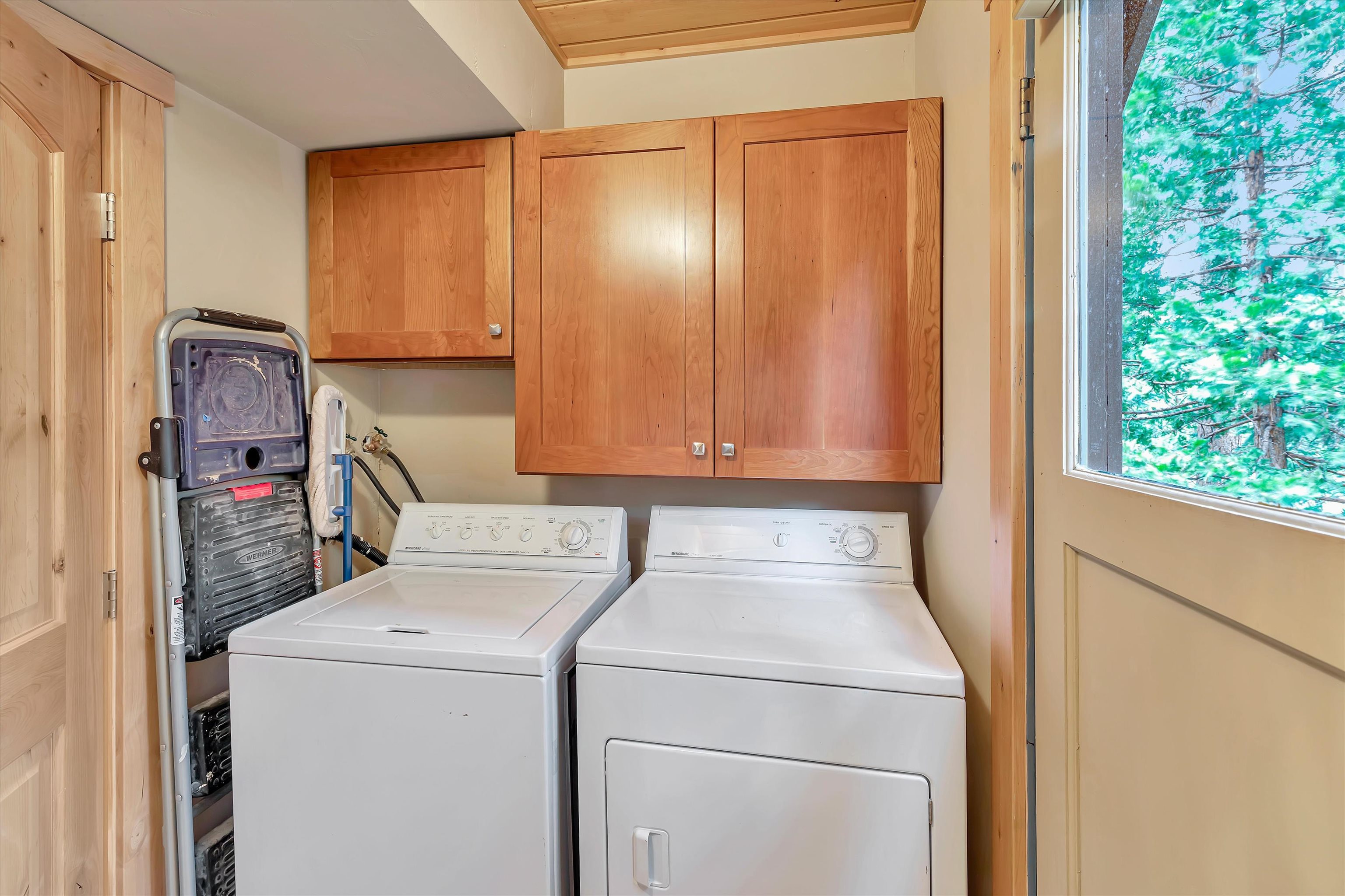 505 Granite Road Carnelian Bay, CA 96140 - Photo 16 of 20 a utility room with dryer and washer