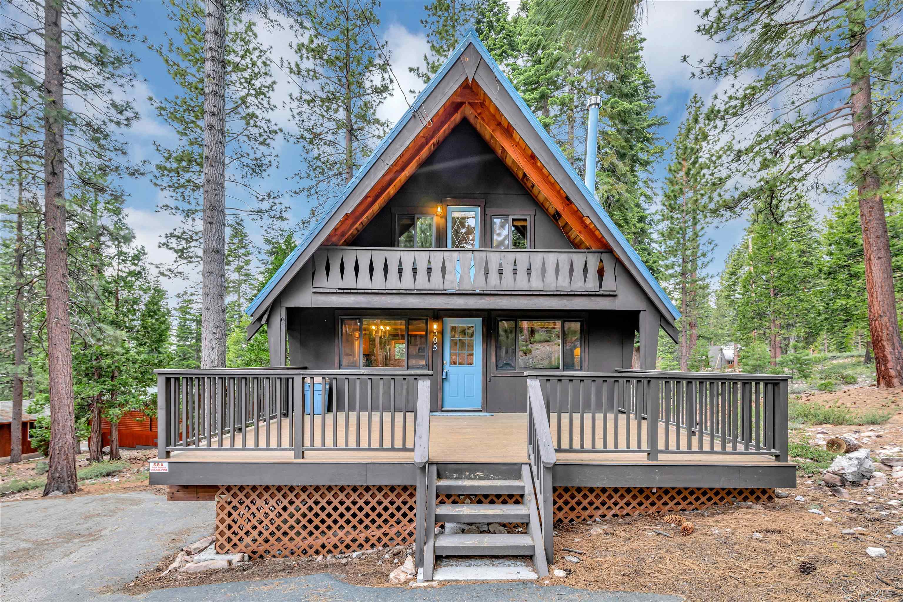 505 Granite Road Carnelian Bay, CA 96140 - Photo 3 of 20 an outdoor view of a house with a deck
