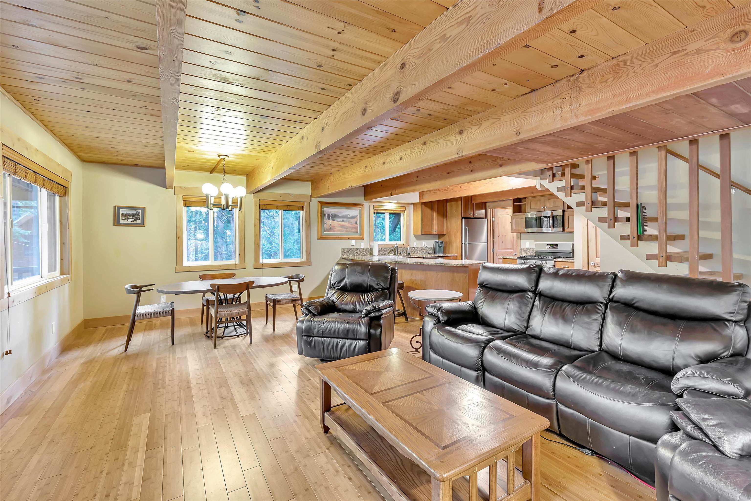 505 Granite Road Carnelian Bay, CA 96140 - Photo 4 of 20 a living room with lots of furniture and wooden floor